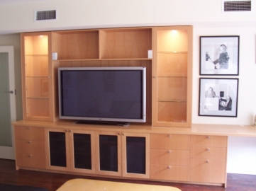 European Beech TV unit with glass display cabinets. Features include cabinet lights,  infra red wire for stereo aplliances and desk to right end